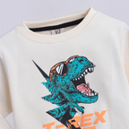 victor and jane boys cream sweatshirt featuring a teal T-Rex graphic wearing orange sunglasses