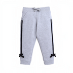 victor and jane grey joggers with black side stripes and decorative bow details at the ankles